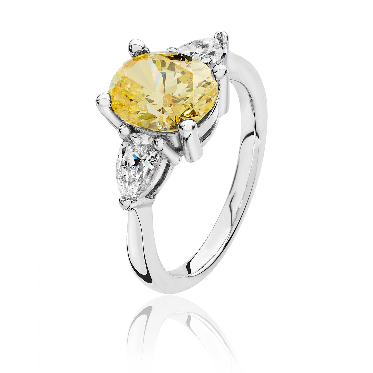 SILVER YELLOW OVAL CENTRE CZ CLAW SET WITH PEAR SHAPE SIDES TRIOLOGY RING