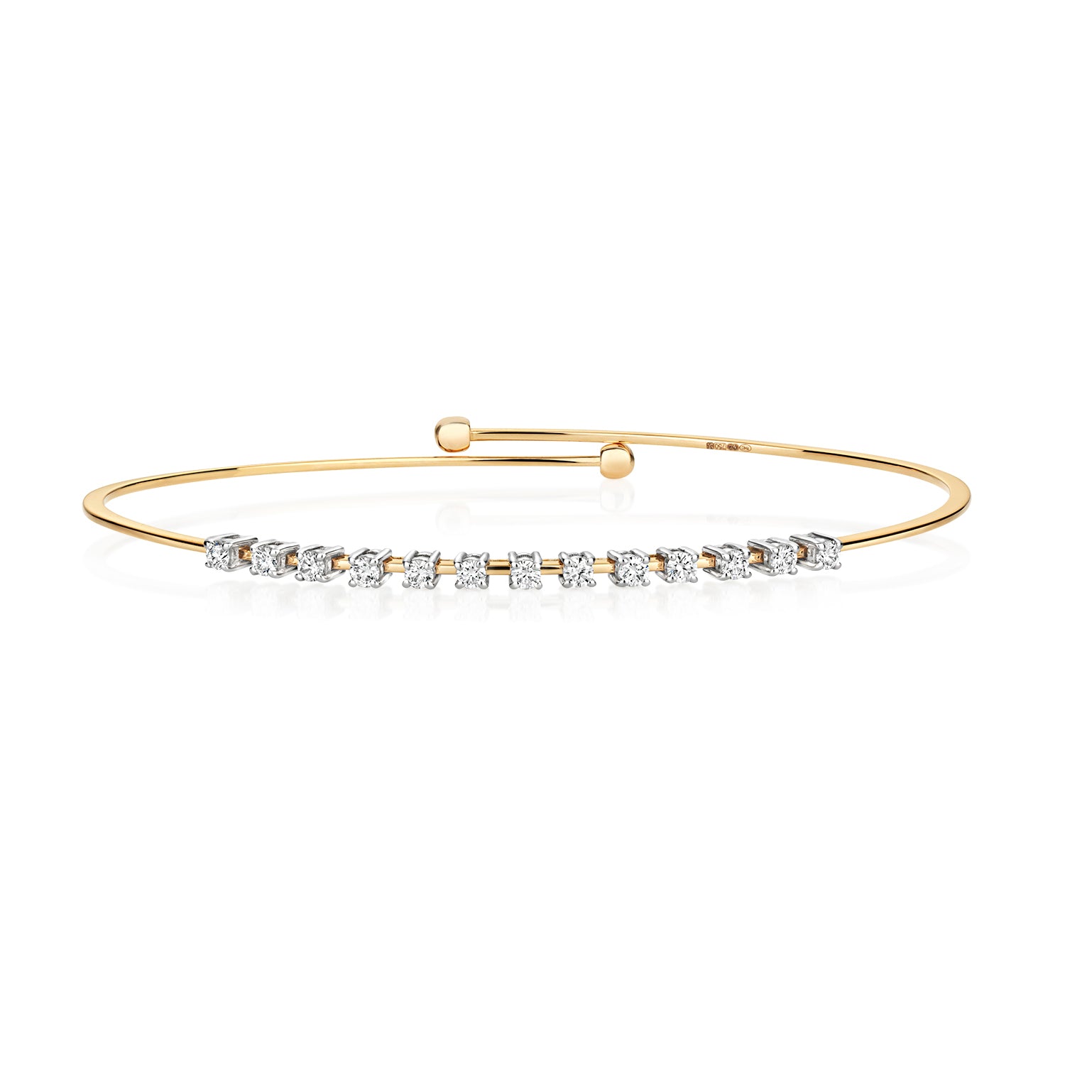 DIAMOND CLAW SET FLEXI BANGLE IN 18CT GOLD