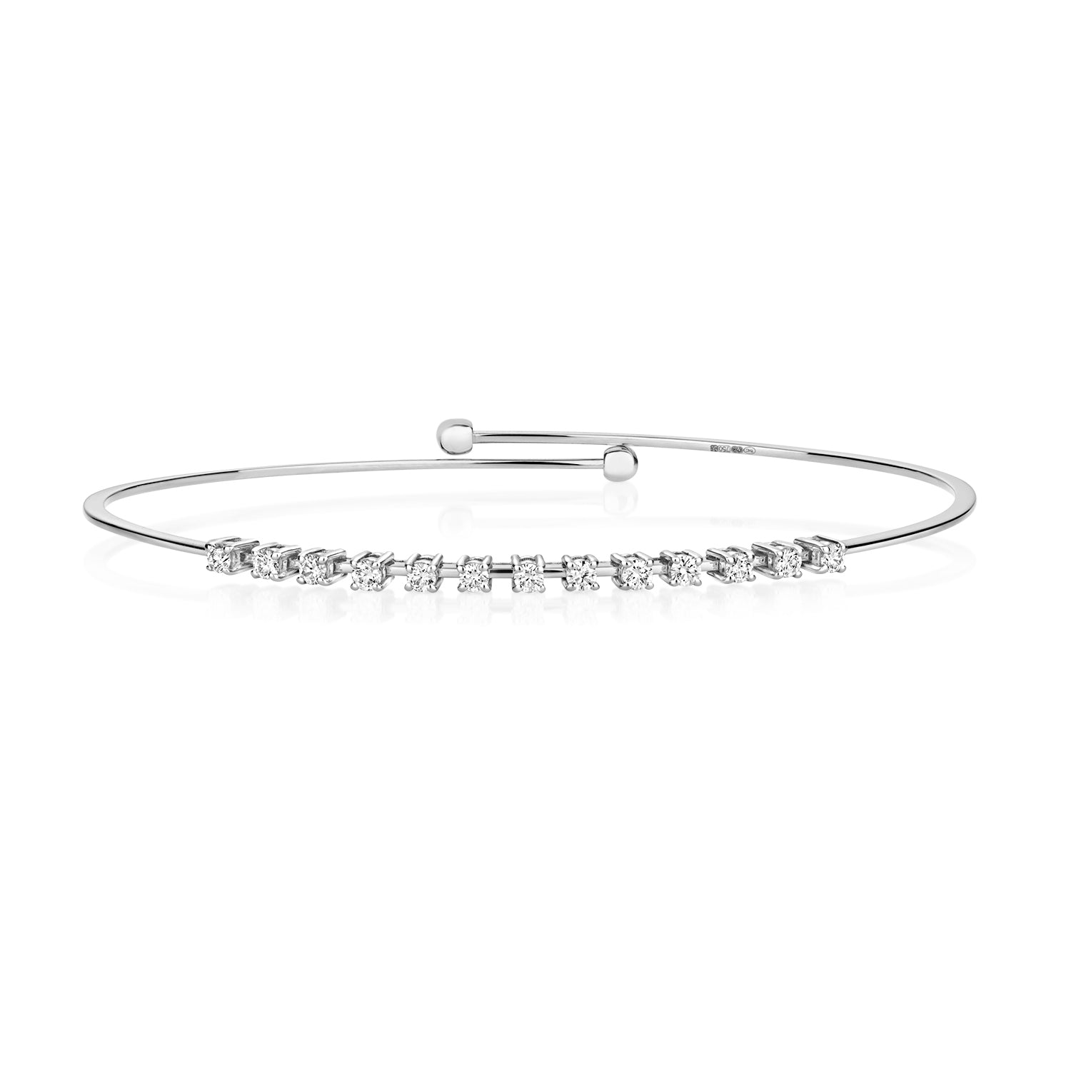 DIAMOND CLAW SET FLEXI BANGLE IN 18CT WHITE GOLD